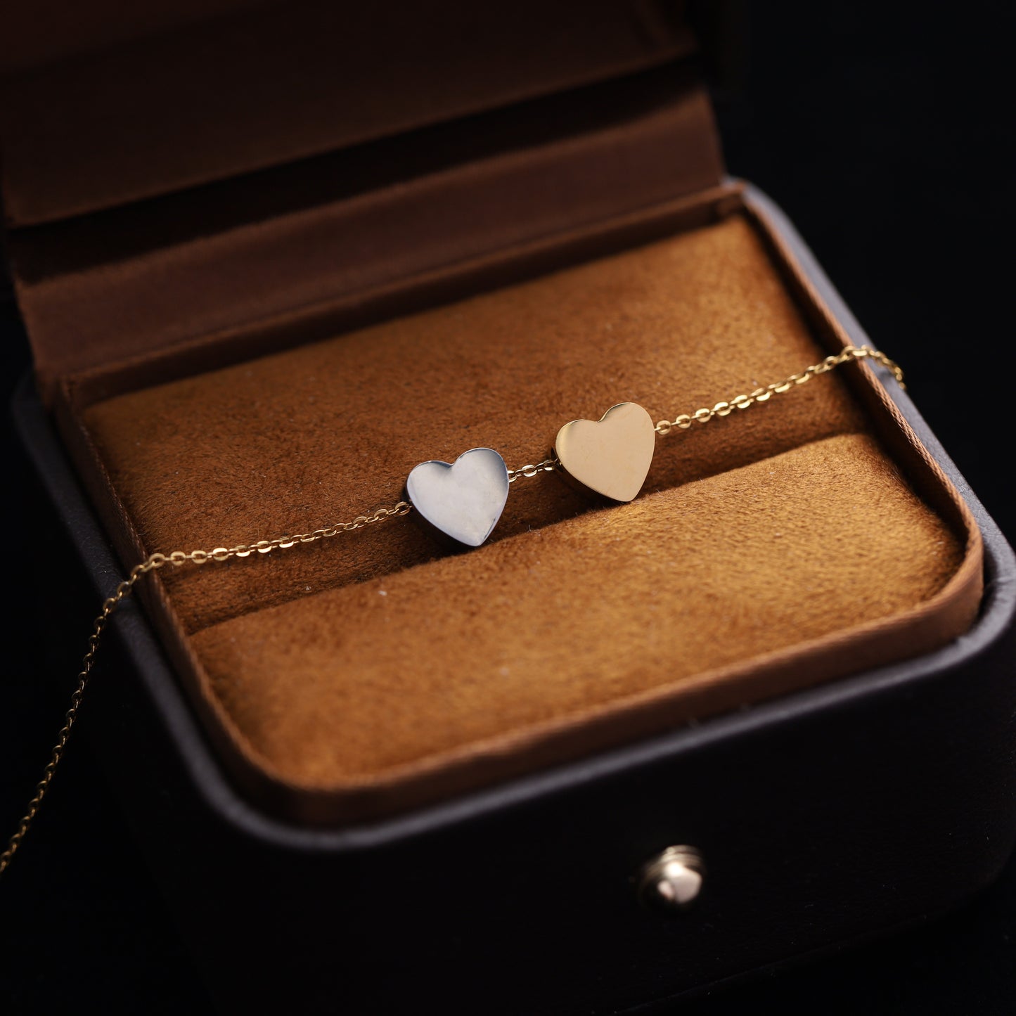 Dainty stainless steel heart necklace, ideal for layering with other pieces.