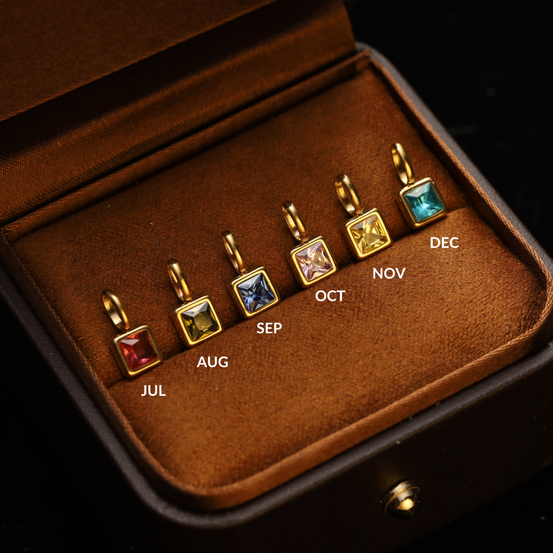 July to December Birthstone displayed on a jewelry box