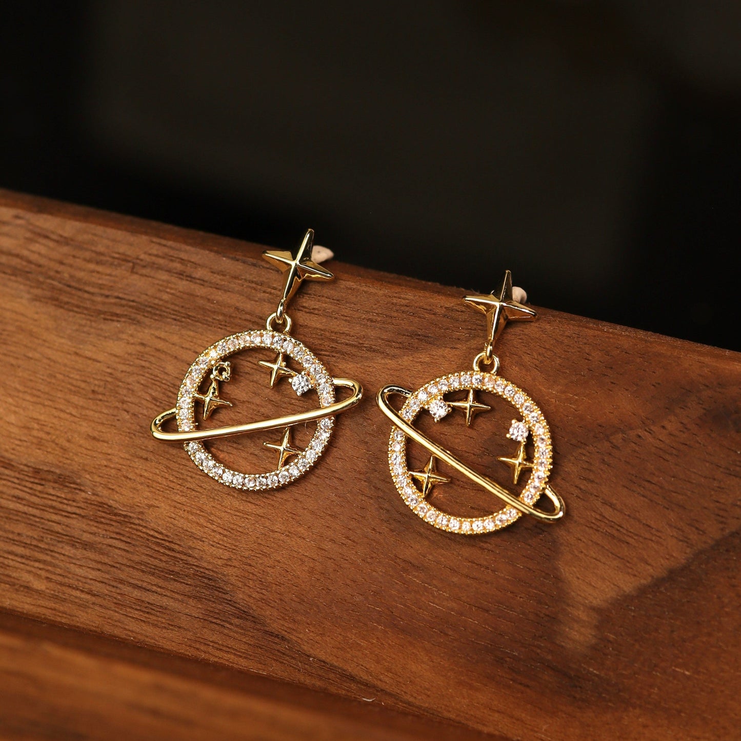 Astrology-themed planet earrings with sterling silver posts