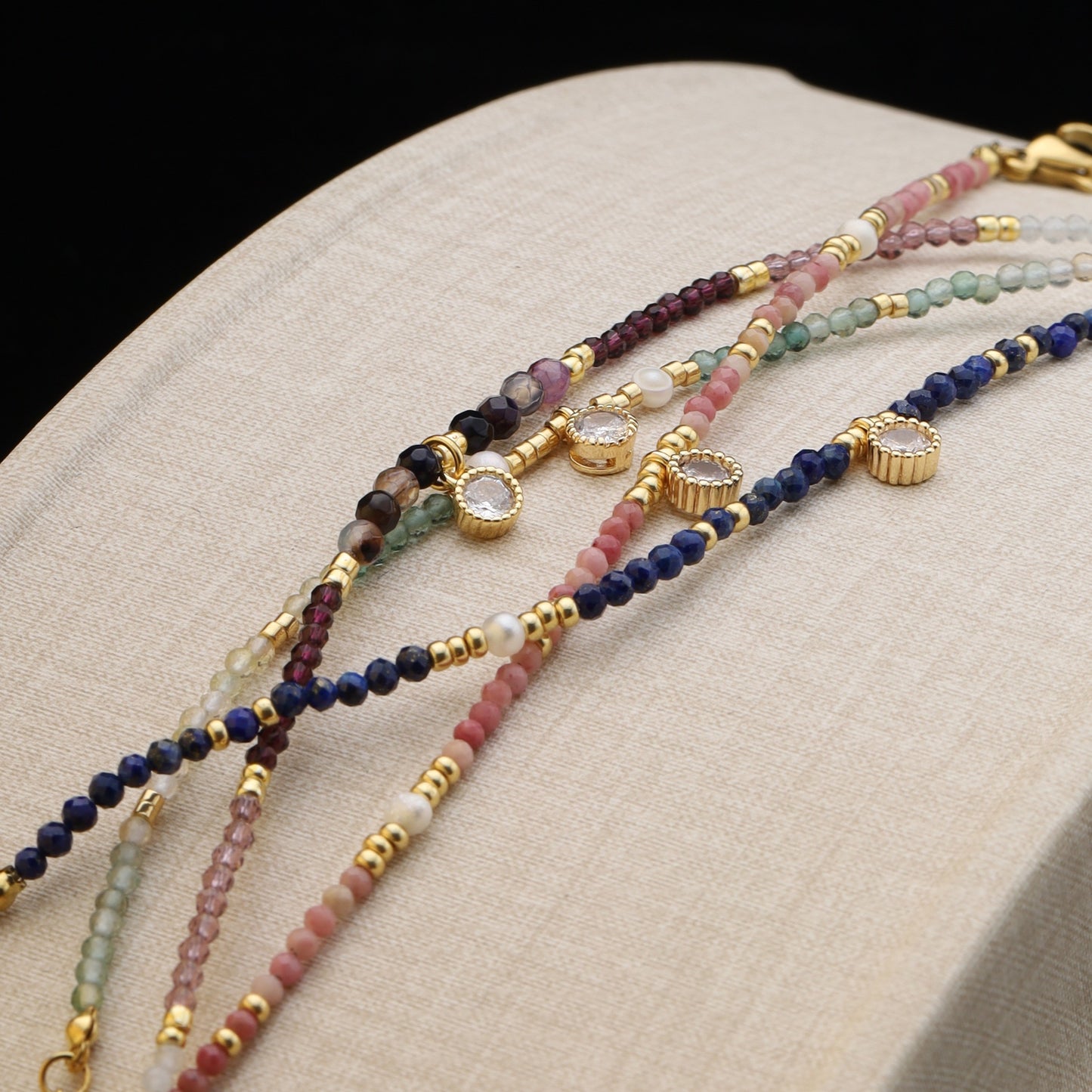 All bracelet styles together, highlighting texture, color, and gold accents.