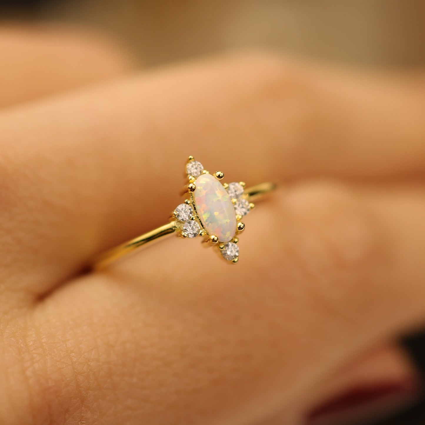 Dainty gold opal ring with marquise fire opal and cubic zirconia accents