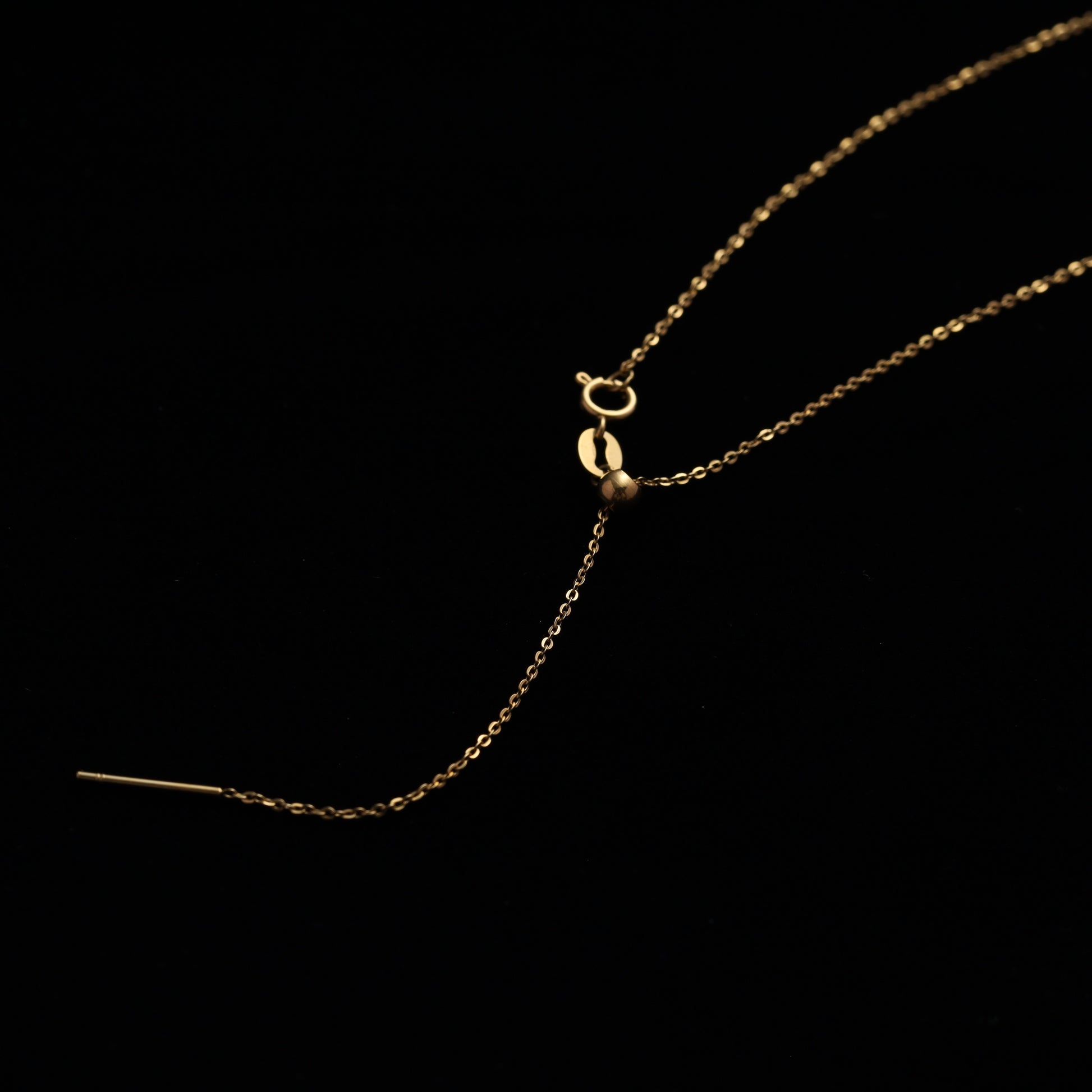 Close-up of adjustable sliding chain mechanism 
